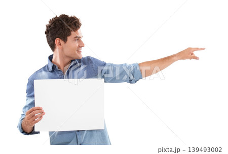 Pointing, poster and young man in a studio with mockup space for marketing, promotion or advertising. Smile, happy and handsome male person from Canada with empty banner isolated by white background. 139493002