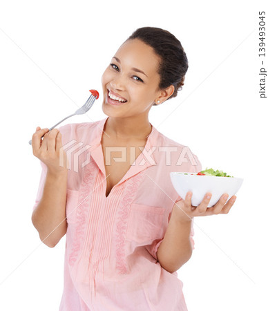 Diet, salad and woman in portrait eating healthy food, detox lunch or breakfast on a white background. Happy, African person or model with tomato, vegetables and green lettuce or vegan meal in studio Diet, salad and woman in portrait eating healthy food, detox lunch or breakfast on a white background. Happy, African person or model with tomato, vegetables and green lettuce or vegan meal in studio 139493045