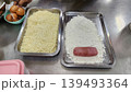 Chef Preparing Breading Station with Meat Flour and Breadcrumbs for Deep Frying 139493364