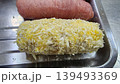 Raw Breaded Meat Cutlet Prepared for Cooking in a Stainless Steel Tray 139493369