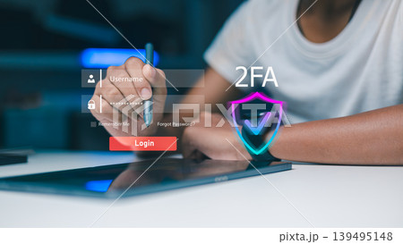 Person using stylus pen for secure login with 2FA two factor authentication and virtual shield icon. Cyber security, data protection and digital identity privacy concept on tablet. Person using stylus pen for secure login with 2FA two factor authentication and virtual shield icon. Cyber security, data protection and digital identity privacy concept on tablet. 139495148