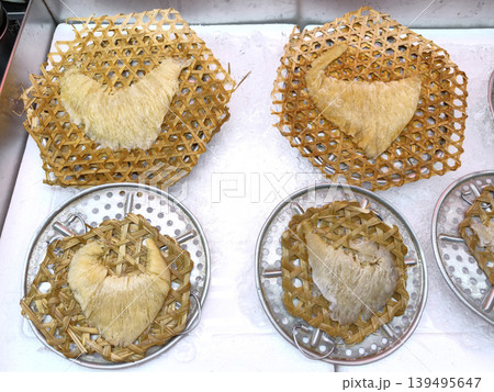 Expensive raw shark fin delicacies on ice at Asian market Expensive raw shark fin delicacies on ice at Asian market 139495647