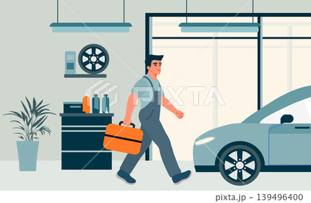 Mechanic walking in modern auto repair shop with tools in hand and approaching electric car 139496400