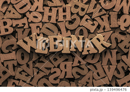 Inscription webinar on pile of old vintage wooden letters. Online education and training concept. Inscription webinar on pile of old vintage wooden letters. Online education and training concept. 139496476