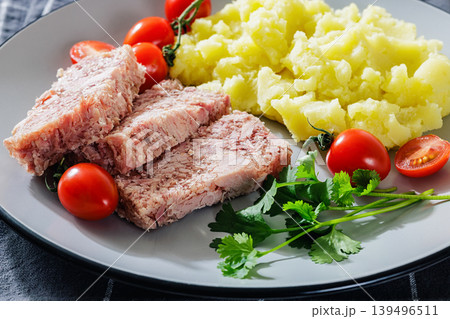 Slices of classic head cheese with mashed potatoes Slices of classic head cheese with mashed potatoes 139496511