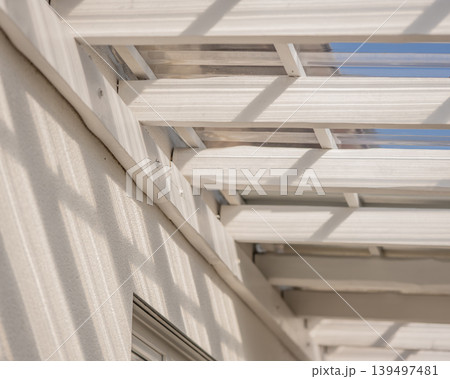 Sunlight dance on white beams Sunlight dance on white beams 139497481