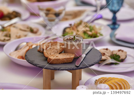Delightful dining experience with gourmet spreads Delightful dining experience with gourmet spreads 139497692