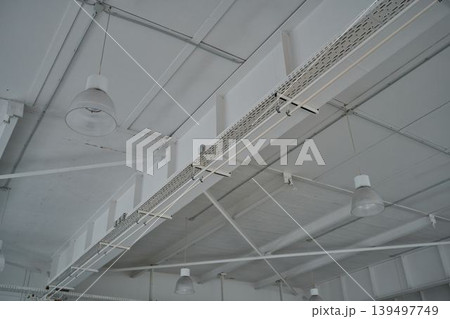 Light shines through a simple ceiling 139497749
