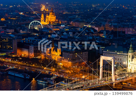 Experience the enchanting skyline of Budapest by night with its glowing landmarks Experience the enchanting skyline of Budapest by night with its glowing landmarks 139499876