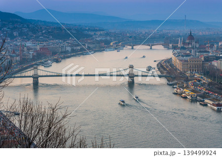 Explore breathtaking views of Budapest's iconic bridges and Danube River at dusk Explore breathtaking views of Budapest's iconic bridges and Danube River at dusk 139499924