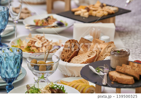 Delightful spread of fresh foods at a gathering Delightful spread of fresh foods at a gathering 139500325