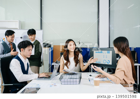 Business team discuss at meeting room. working together with laptop ,tablet and smart phone on desk Financial accountant , planner , meeting , introduction concept. Business team discuss at meeting room. working together with laptop ,tablet and smart phone on desk Financial accountant , planner , meeting , introduction concept. 139501598