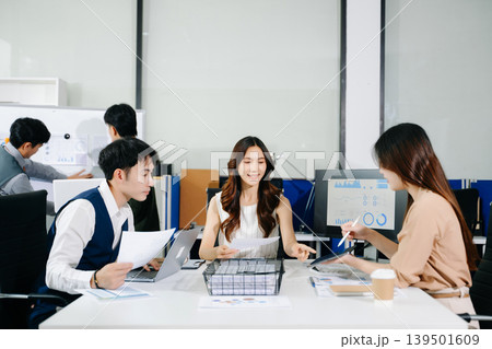 Business team discuss at meeting room. working together with laptop ,tablet and smart phone on desk Financial accountant , planner , meeting , introduction concept. Business team discuss at meeting room. working together with laptop ,tablet and smart phone on desk Financial accountant , planner , meeting , introduction concept. 139501609
