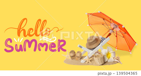 Bright umbrella and beach items create a summer scene Bright umbrella and beach items create a summer scene 139504365