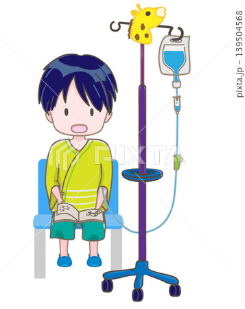 椅子に座って左腕に点滴をしている子供 本を倒して読んでいるイメージ 椅子に座って左腕に点滴をしている子供 本を倒して読んでいるイメージ 139504568