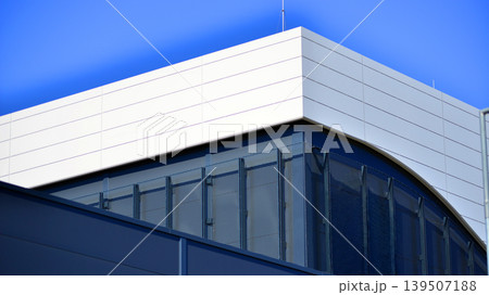 Empty new constructed automobile dealership. The building contains a sales room, offices, service and parts warehouse. Empty new constructed automobile dealership. The building contains a sales room, offices, service and parts warehouse. 139507188