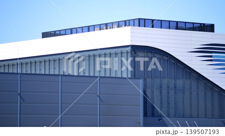 Empty new constructed automobile dealership. The building contains a sales room, offices, service and parts warehouse. Empty new constructed automobile dealership. The building contains a sales room, offices, service and parts warehouse. 139507193