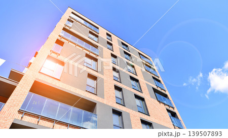 Downtown modern residential architecture. Architectural details of modern apartment building. Modern european residential apartment building complex. Downtown modern residential architecture. Architectural details of modern apartment building. Modern european residential apartment building complex. 139507893