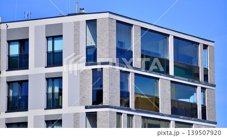 Downtown modern residential architecture. Architectural details of modern apartment building. Modern european residential apartment building complex. 139507920