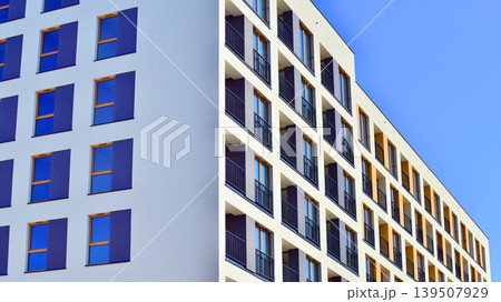Downtown modern residential architecture. Architectural details of modern apartment building. Modern european residential apartment building complex. Downtown modern residential architecture. Architectural details of modern apartment building. Modern european residential apartment building complex. 139507929