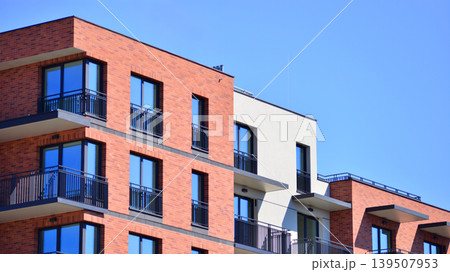 Downtown modern residential architecture. Architectural details of modern apartment building. Modern european residential apartment building complex. 139507953