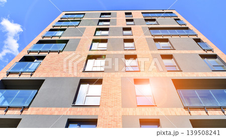 Downtown modern residential architecture. Architectural details of modern apartment building. Modern european residential apartment building complex. Downtown modern residential architecture. Architectural details of modern apartment building. Modern european residential apartment building complex. 139508241