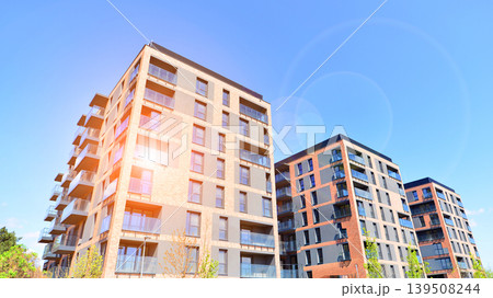 Downtown modern residential architecture. Architectural details of modern apartment building. Modern european residential apartment building complex. Downtown modern residential architecture. Architectural details of modern apartment building. Modern european residential apartment building complex. 139508244