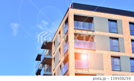 Downtown modern residential architecture. Architectural details of modern apartment building. Modern european residential apartment building complex. Downtown modern residential architecture. Architectural details of modern apartment building. Modern european residential apartment building complex. 139508259