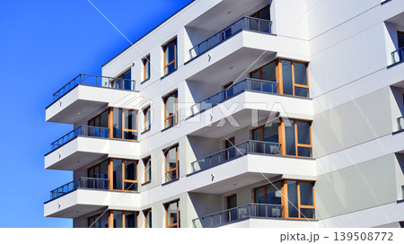 Downtown modern residential architecture. Architectural details of modern apartment building. Modern european residential apartment building complex. Downtown modern residential architecture. Architectural details of modern apartment building. Modern european residential apartment building complex. 139508772