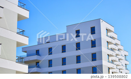 Downtown modern residential architecture. Architectural details of modern apartment building. Modern european residential apartment building complex. Downtown modern residential architecture. Architectural details of modern apartment building. Modern european residential apartment building complex. 139508802