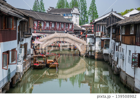 tourist boat dock by bridge and city god temple, Zhujiajiao, Shanghai tourist boat dock by bridge and city god temple, Zhujiajiao, Shanghai 139508982