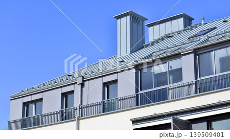 Downtown modern residential architecture. Architectural details of modern apartment building. Modern european residential apartment building complex. Downtown modern residential architecture. Architectural details of modern apartment building. Modern european residential apartment building complex. 139509401