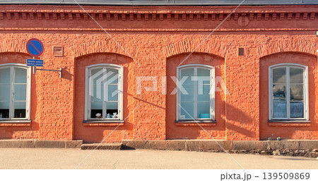 Old European Architecture with Rustic Red Wall and Windows in Helsinki, Finland 139509869
