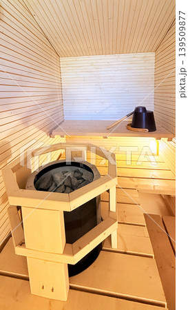 Modern Scandinavian Sauna Room with Warm Wooden Interior for Relaxation and Wellness Modern Scandinavian Sauna Room with Warm Wooden Interior for Relaxation and Wellness 139509877