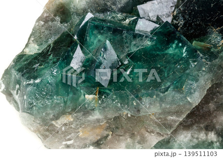 Macro mineral stone Fluorite on a white background 139511103