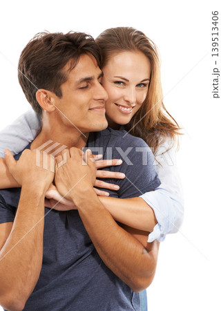 Happy couple, hug and love in care, compassion or trust for embrace against a white studio background. Handsome man and young woman smile for romance, affection or relationship together on mockup Happy couple, hug and love in care, compassion or trust for embrace against a white studio background. Handsome man and young woman smile for romance, affection or relationship together on mockup 139513406