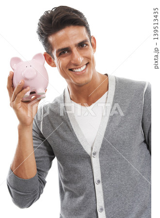 Portrait, man and piggy bank in studio for investment, finance or investing income on white background. Happy model, financial savings or moneybox for growth, cash funding or economy of future wealth 139513435