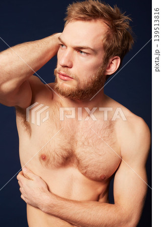 Man, shirtless with muscle and beauty in studio, pose with confidence and fitness isolated on dark background. Topless, cosmetic care and skin, German model with healthy and strong, muscular body Man, shirtless with muscle and beauty in studio, pose with confidence and fitness isolated on dark background. Topless, cosmetic care and skin, German model with healthy and strong, muscular body 139513816