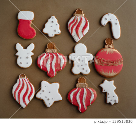 Christmas and New Year's decor. Beautiful, diverse gingerbread cookies on a beige background 139513830