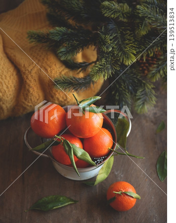 Warm and cozy still life with tangerines. 139513834