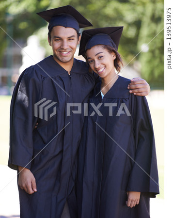 Happy couple, portrait and hug for outdoor graduation, qualification or career ambition in education. Man and woman student or graduate smile for higher certificate, diploma or degree in nature Happy couple, portrait and hug for outdoor graduation, qualification or career ambition in education. Man and woman student or graduate smile for higher certificate, diploma or degree in nature 139513975