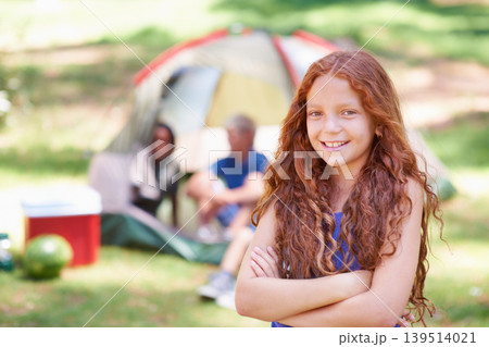 Girl, child and arms crossed, smile at summer camp and nature with fun outdoor for youth in portrait. Kid at campsite in park for adventure and vacation, childhood and recreation with happiness Girl, child and arms crossed, smile at summer camp and nature with fun outdoor for youth in portrait. Kid at campsite in park for adventure and vacation, childhood and recreation with happiness 139514021