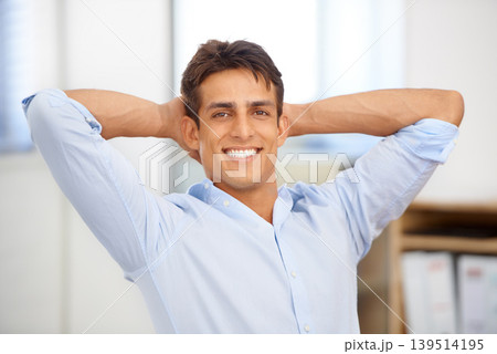 Portrait, relax or happy man in workplace on break for mental health, pride or wellness at desk. Calm, freedom or male employee with smile or hand behind his head in a business stretching or resting Portrait, relax or happy man in workplace on break for mental health, pride or wellness at desk. Calm, freedom or male employee with smile or hand behind his head in a business stretching or resting 139514195