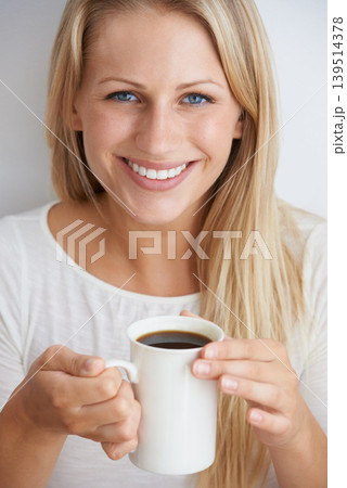 Woman, portrait and happy in studio with coffee for morning caffeine, break and energy for relax and drink. Person, face and smile with beverage, cup and cheerful with closeup on white background Woman, portrait and happy in studio with coffee for morning caffeine, break and energy for relax and drink. Person, face and smile with beverage, cup and cheerful with closeup on white background 139514378