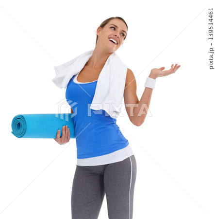 Yoga mat, hand and young woman in studio with mockup space for exercise or workout. Smile, equipment and happy female person with show gesture for fitness or sports isolated by white background. Yoga mat, hand and young woman in studio with mockup space for exercise or workout. Smile, equipment and happy female person with show gesture for fitness or sports isolated by white background. 139514461