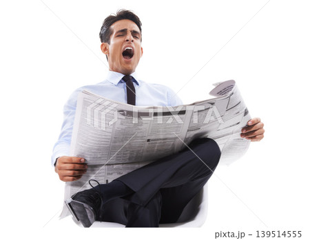 Business man, reading newspaper and studio with yawn, tired or finance information by white background. Person, newsletter or paper with fatigue, burnout and learning for stats, index or stock market 139514555