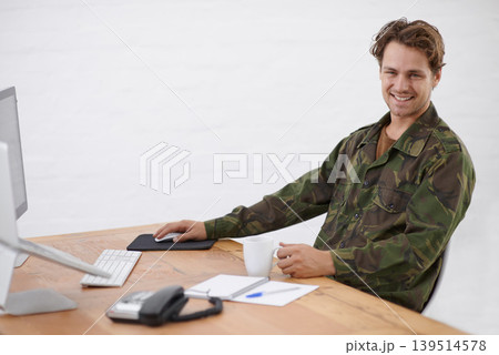 Military man in office, research at desk and smile in portrait with army operation and gather intelligence online. Young soldier with coffee cup, internet search and security surveillance with tech 139514578