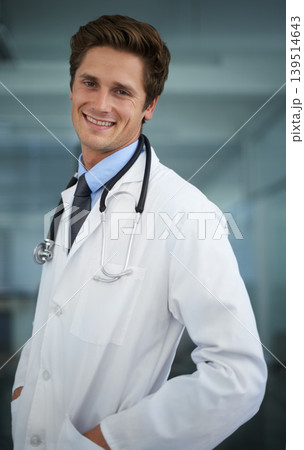 Smile, pride and portrait of man doctor with stethoscope for positive, good and confident attitude. Happy, career and professional young male healthcare worker in medical office of hospital or clinic Smile, pride and portrait of man doctor with stethoscope for positive, good and confident attitude. Happy, career and professional young male healthcare worker in medical office of hospital or clinic 139514643