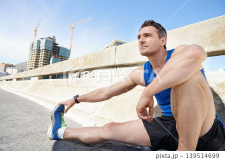 Man, stretching legs and runner in city, warm up for cardio workout and fitness outdoor. Athlete, sports and running in New York with health, wellness and ready for race or marathon on urban bridge 139514699