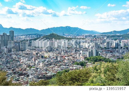 Seoul, South Korea - Mar. 08, 2026 : Panoramic cityscape of Seoul with dense residential buildings and Han River from Yongmasan observatory Seoul, South Korea - Mar. 08, 2026 : Panoramic cityscape of Seoul with dense residential buildings and Han River from Yongmasan observatory 139515957